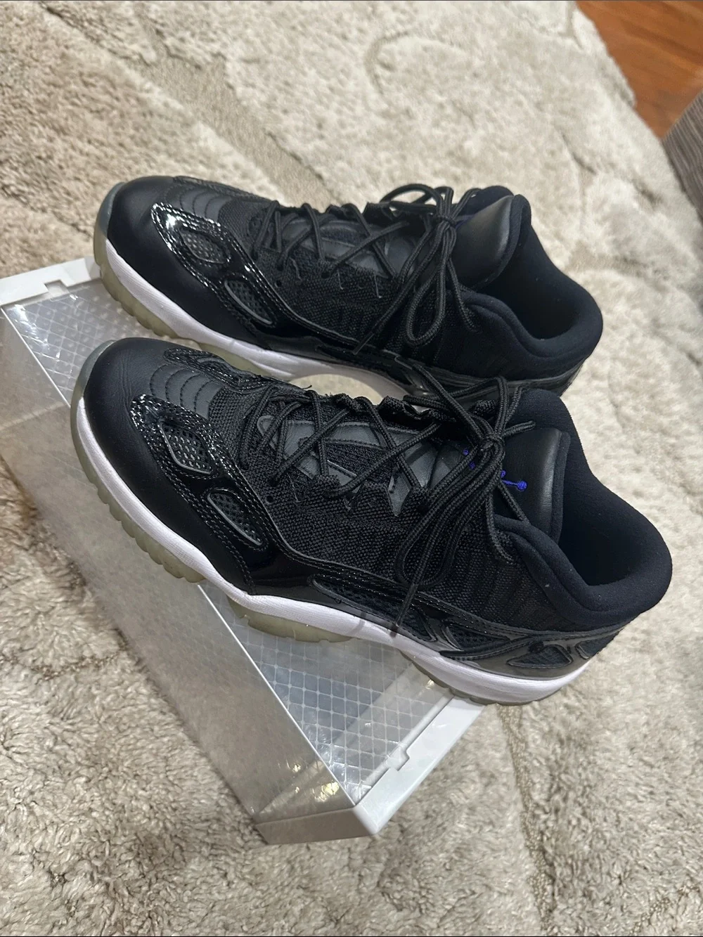 Air Jordan Retro 11 Black and White Low-Top Sneakers with Icy Outsole